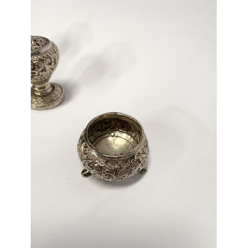 37 - AN EXCELLENT CASED INDIAN SILVER CONDIMENT SET, c.1890, to include four salts, four mustard pots and... 