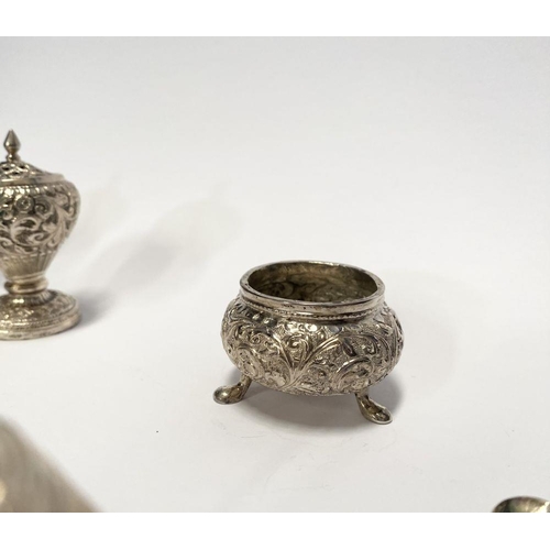 37 - AN EXCELLENT CASED INDIAN SILVER CONDIMENT SET, c.1890, to include four salts, four mustard pots and... 