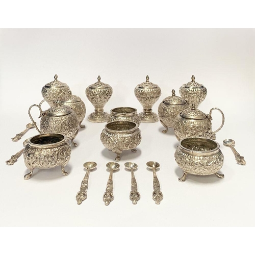 37 - AN EXCELLENT CASED INDIAN SILVER CONDIMENT SET, c.1890, to include four salts, four mustard pots and... 