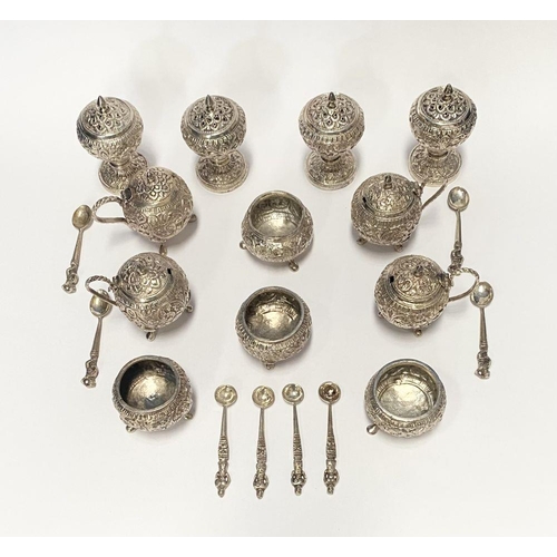 37 - AN EXCELLENT CASED INDIAN SILVER CONDIMENT SET, c.1890, to include four salts, four mustard pots and... 