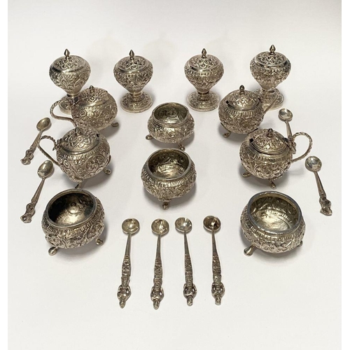 37 - AN EXCELLENT CASED INDIAN SILVER CONDIMENT SET, c.1890, to include four salts, four mustard pots and... 