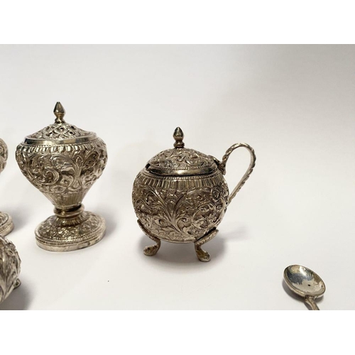 37 - AN EXCELLENT CASED INDIAN SILVER CONDIMENT SET, c.1890, to include four salts, four mustard pots and... 