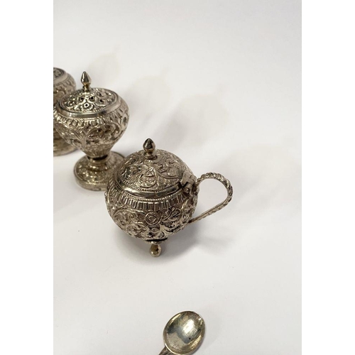 37 - AN EXCELLENT CASED INDIAN SILVER CONDIMENT SET, c.1890, to include four salts, four mustard pots and... 