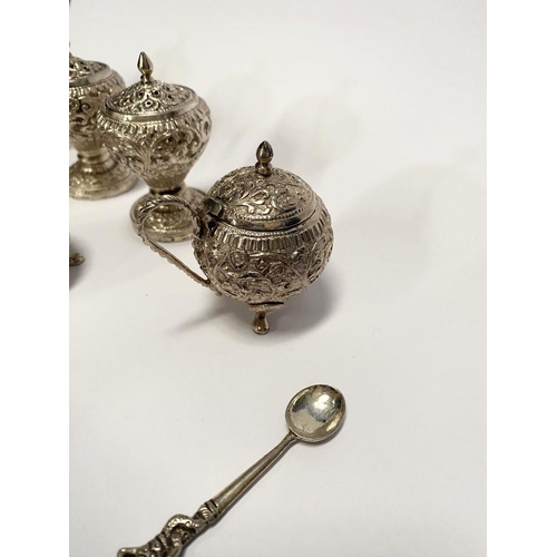 37 - AN EXCELLENT CASED INDIAN SILVER CONDIMENT SET, c.1890, to include four salts, four mustard pots and... 