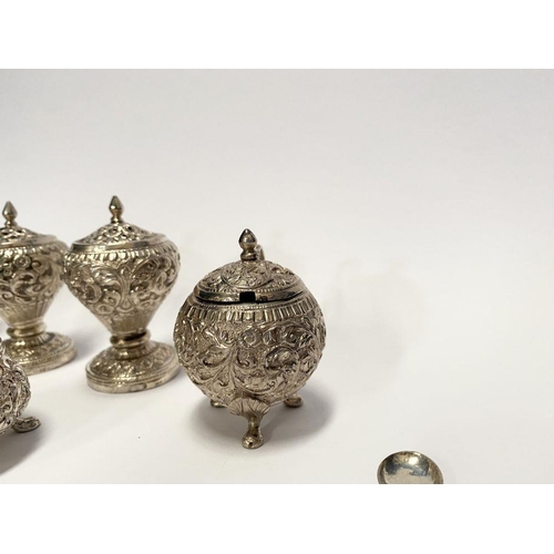 37 - AN EXCELLENT CASED INDIAN SILVER CONDIMENT SET, c.1890, to include four salts, four mustard pots and... 