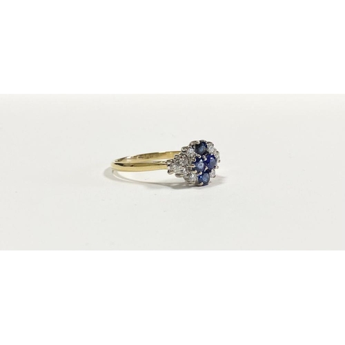 4 - A FANTASTIC 18CT YELLOW GOLD SAPPHIRE & DIAMOND CLUSTER RING, with four round cut vibrant sapphires ... 