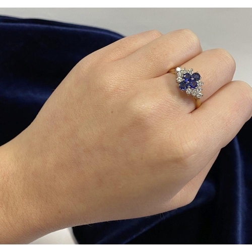 4 - A FANTASTIC 18CT YELLOW GOLD SAPPHIRE & DIAMOND CLUSTER RING, with four round cut vibrant sapphires ... 