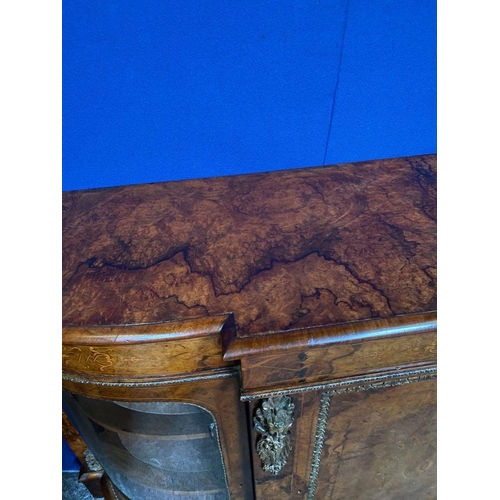 41 - A VERY FINE VICTORIAN WALNUT INLAID CREDENZA, bow fronted, highly decorated throughout. The shaped t... 