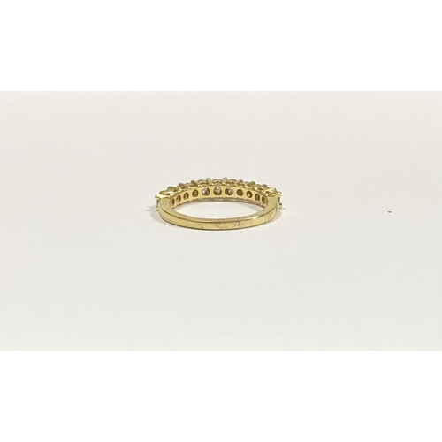 45 - A STUNNING 18CT YELLOW GOLD DIAMOND ETERNITY RING, with eleven round cut diamonds graduating in size... 