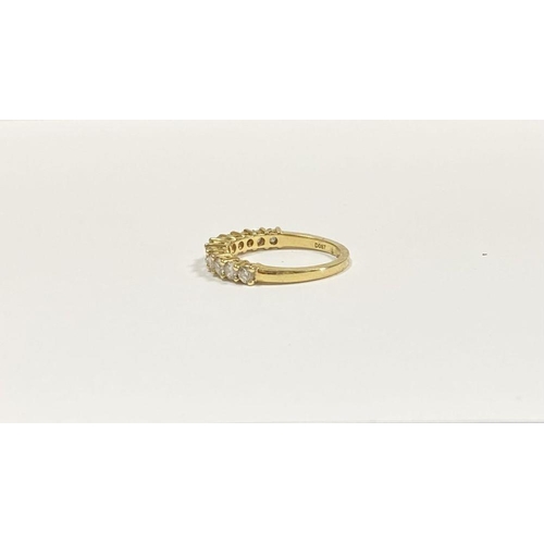 45 - A STUNNING 18CT YELLOW GOLD DIAMOND ETERNITY RING, with eleven round cut diamonds graduating in size... 