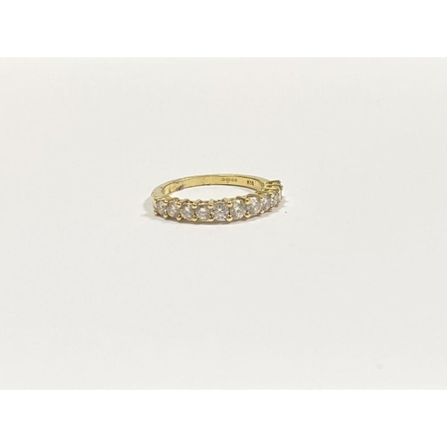 45 - A STUNNING 18CT YELLOW GOLD DIAMOND ETERNITY RING, with eleven round cut diamonds graduating in size... 