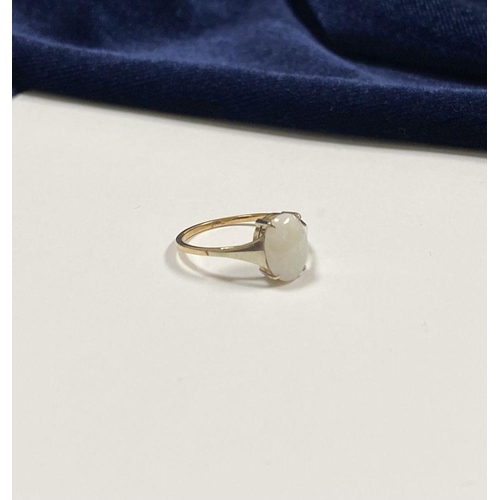 55 - AN ELEGANT 9CT YELLOW GOLD OPAL SOLITAIRE RING, with oval cut opal in raised four prong claw setting... 