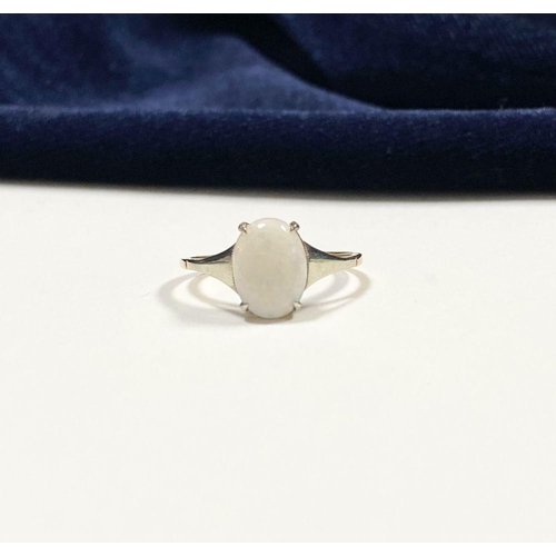 55 - AN ELEGANT 9CT YELLOW GOLD OPAL SOLITAIRE RING, with oval cut opal in raised four prong claw setting... 