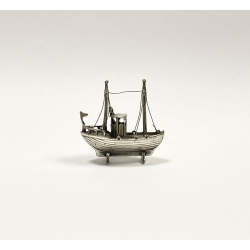 57 - A CHARMING STERLING SILVER MINIATURE FISHING BOAT, Hallmarked with European assay mark and marked 92... 