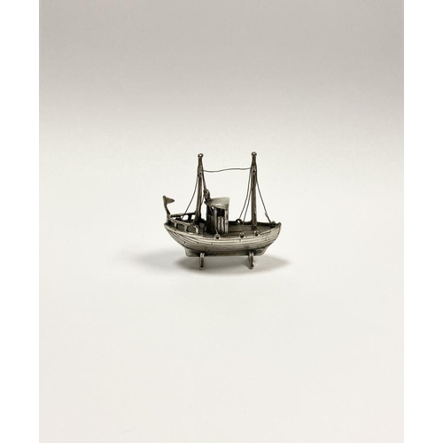 57 - A CHARMING STERLING SILVER MINIATURE FISHING BOAT, Hallmarked with European assay mark and marked 92... 