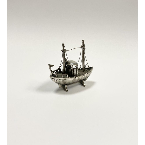 57 - A CHARMING STERLING SILVER MINIATURE FISHING BOAT, Hallmarked with European assay mark and marked 92... 