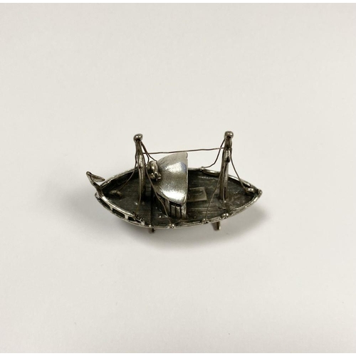 57 - A CHARMING STERLING SILVER MINIATURE FISHING BOAT, Hallmarked with European assay mark and marked 92... 