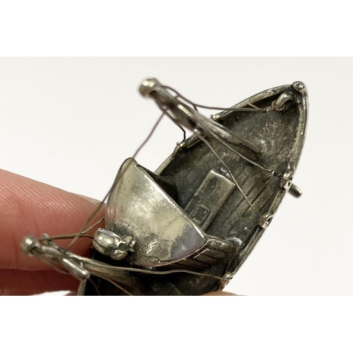 57 - A CHARMING STERLING SILVER MINIATURE FISHING BOAT, Hallmarked with European assay mark and marked 92... 