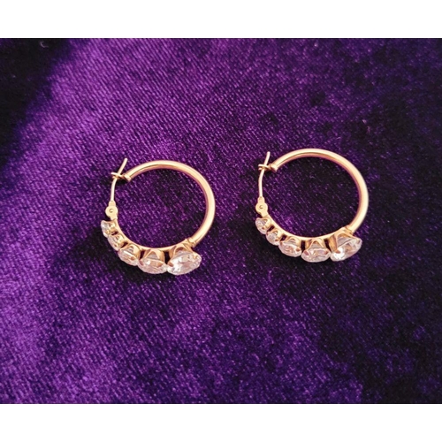 58 - A GREAT PAIR OF 9CT YELLOW GOLD WHITE SAPPHIRE HOOP STYLE EARRINGS, with graduated setting of 5 whit... 