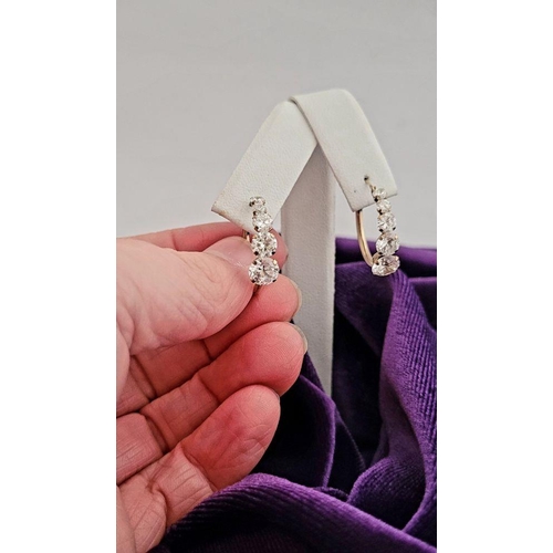 58 - A GREAT PAIR OF 9CT YELLOW GOLD WHITE SAPPHIRE HOOP STYLE EARRINGS, with graduated setting of 5 whit... 