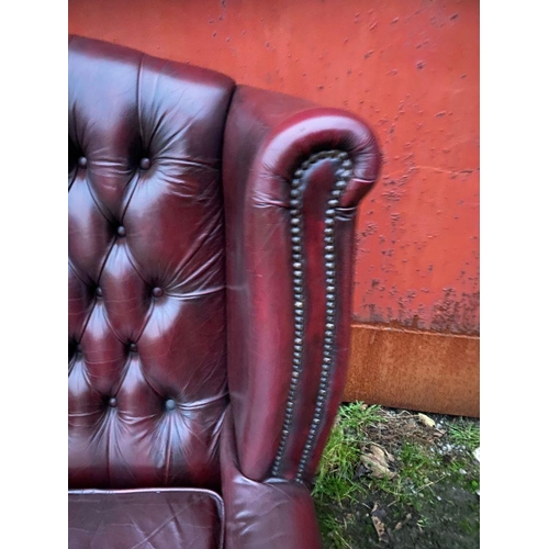 67 - A GOOD LEATHER CHESTERFIELD WINGBACK ARMCHAIR, nice deep button back, stud upholstery to wingback an... 