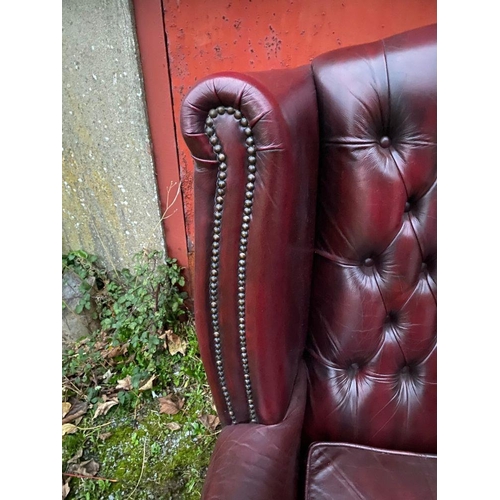 67 - A GOOD LEATHER CHESTERFIELD WINGBACK ARMCHAIR, nice deep button back, stud upholstery to wingback an... 