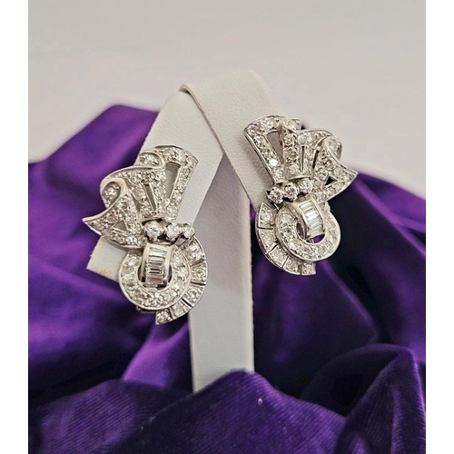 68 - A WONDERFUL ART DECO PAIR OF SPARKING DIAMOND EARRINGS IN PLATINUM, circa 1940s / 50s, with an appro... 