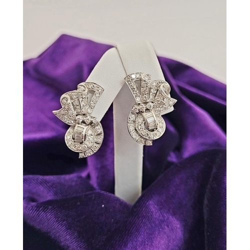 68 - A WONDERFUL ART DECO PAIR OF SPARKING DIAMOND EARRINGS IN PLATINUM, circa 1940s / 50s, with an appro... 