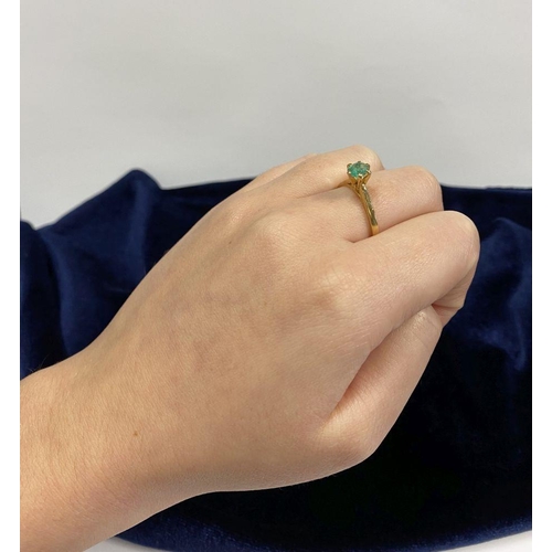 69 - A PRETTY 18CT YELLOW GOLD OVAL CUT EMERALD SOLITAIRE RING, with oval cut emerald in raised six prong... 