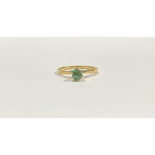 69 - A PRETTY 18CT YELLOW GOLD OVAL CUT EMERALD SOLITAIRE RING, with oval cut emerald in raised six prong... 