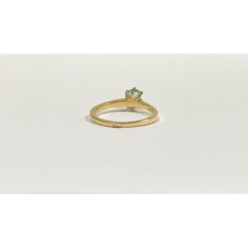 69 - A PRETTY 18CT YELLOW GOLD OVAL CUT EMERALD SOLITAIRE RING, with oval cut emerald in raised six prong... 