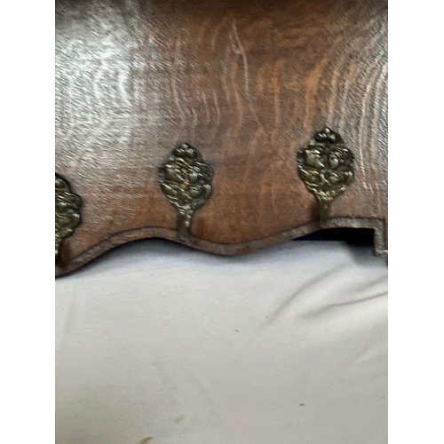 76 - A VERY NICE CARVED OAK HANGING HALL/COAT STAND, with carved border to top which can be used as shelf... 