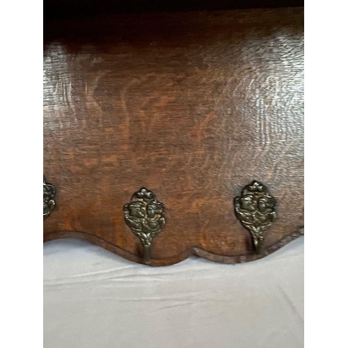 76 - A VERY NICE CARVED OAK HANGING HALL/COAT STAND, with carved border to top which can be used as shelf... 