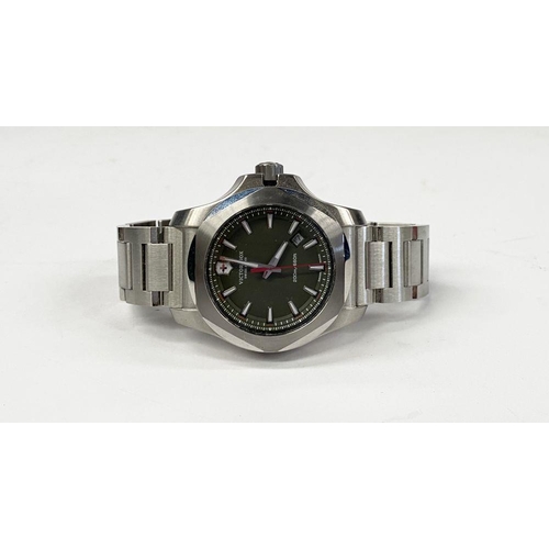 78 - A CASED VICTORINOX MENS SWISS ARMY WATCH, I.N.O.X. in original case with guide and warranty. In work... 