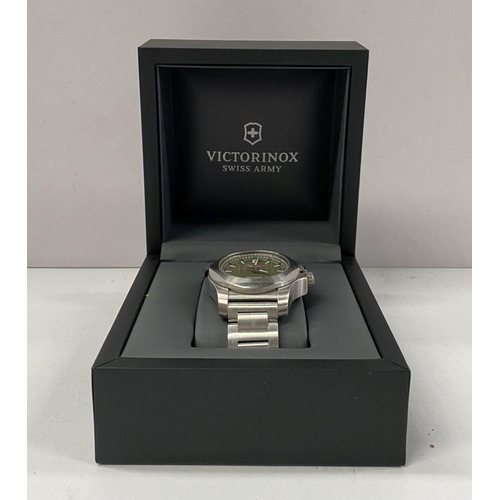 78 - A CASED VICTORINOX MENS SWISS ARMY WATCH, I.N.O.X. in original case with guide and warranty. In work... 