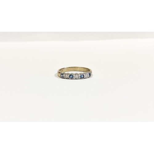 79 - A BEAUTIFUL 9CT YELLOW GOLD DIAMOND & SAPPHIRE SEVEN STONE RING, with four round cut sapphires separ... 