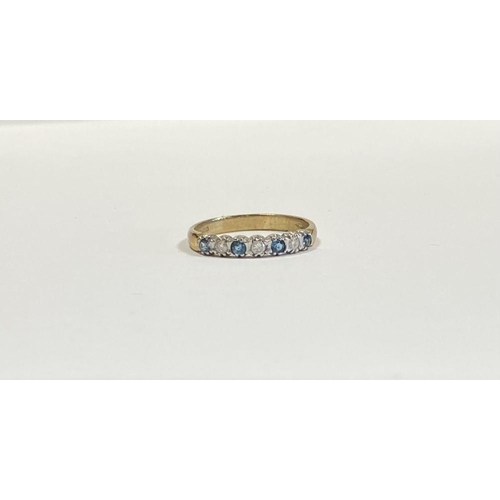 79 - A BEAUTIFUL 9CT YELLOW GOLD DIAMOND & SAPPHIRE SEVEN STONE RING, with four round cut sapphires separ... 