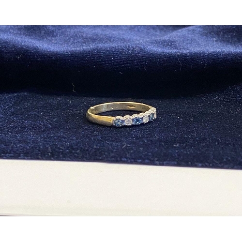 79 - A BEAUTIFUL 9CT YELLOW GOLD DIAMOND & SAPPHIRE SEVEN STONE RING, with four round cut sapphires separ... 