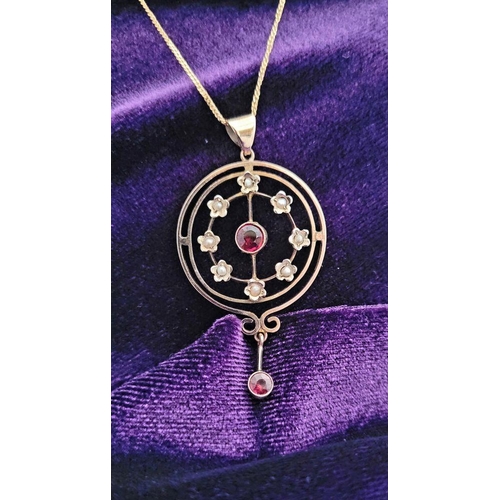 8 - A BEAUTIFUL EDWARDIAN 9CT YELLOW GOLD GARNET & SEED PEARL PENDANT WITH GOLD CHAIN, the pendant is a ... 