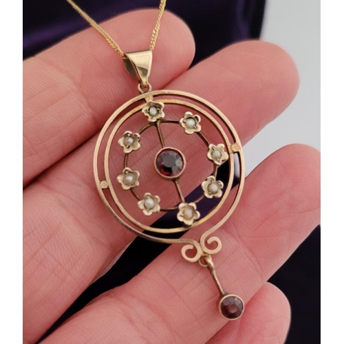 8 - A BEAUTIFUL EDWARDIAN 9CT YELLOW GOLD GARNET & SEED PEARL PENDANT WITH GOLD CHAIN, the pendant is a ... 