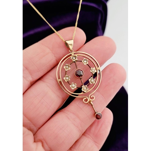 8 - A BEAUTIFUL EDWARDIAN 9CT YELLOW GOLD GARNET & SEED PEARL PENDANT WITH GOLD CHAIN, the pendant is a ... 