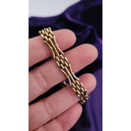 87 - A GOOD 9CT ROSE GOLD GATE LINK BRACELET, with heart shaped lock.