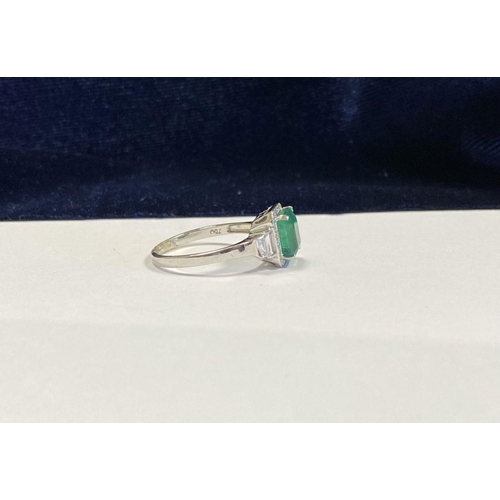 9 - AN 18CT WHITE GOLD COLOMBIAN EMERALD & DIAMOND RING, with a magnificent emerald cut natural Colombia... 