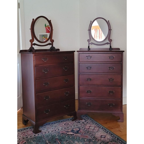 90 - A PAIR OF SWING MIRRORS, the oval shaped mirrors are held between a pair of scroll shaped uprights, ... 