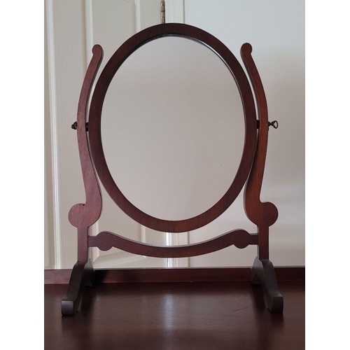 90 - A PAIR OF SWING MIRRORS, the oval shaped mirrors are held between a pair of scroll shaped uprights, ... 