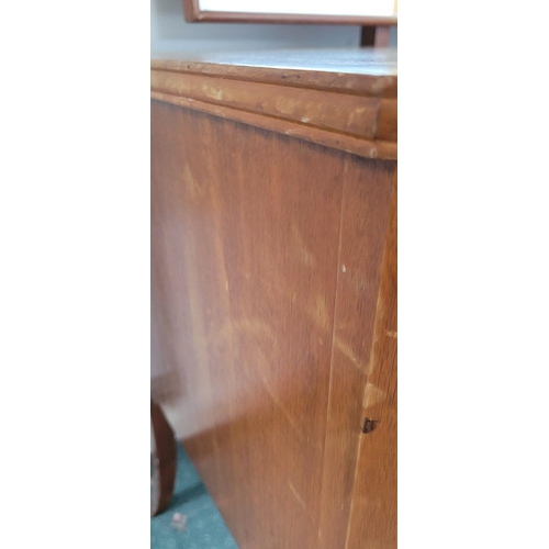 93 - A MID 20TH CENTURY INLAID FIDDLE MAHOGANY DRESSING TABLE, with mirror. The Mirror is raised up on a ... 