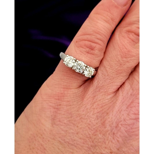 97 - A FINE 18CT WHITE GOLD THREE STONE DIAMOND RING, the diamonds are around 1.45ct in weight, very good... 