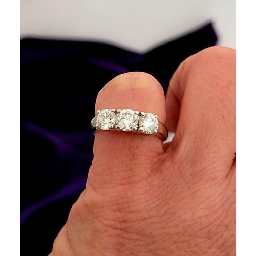 97 - A FINE 18CT WHITE GOLD THREE STONE DIAMOND RING, the diamonds are around 1.45ct in weight, very good... 