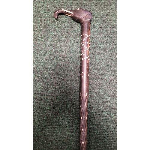 212 - AN 19TH CENTURY INDIAN CARVED BONE & EBONY WALKING STICK, The handle in the form of an elephant head... 