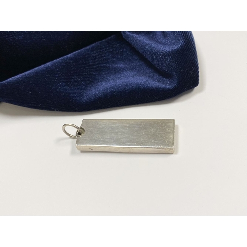 104 - A LARGE STERLING SILVER INGOT PENDANT, Hallmarked CJ, London c.1977. Dimensions: 4.3cm high x 1.5cm ... 